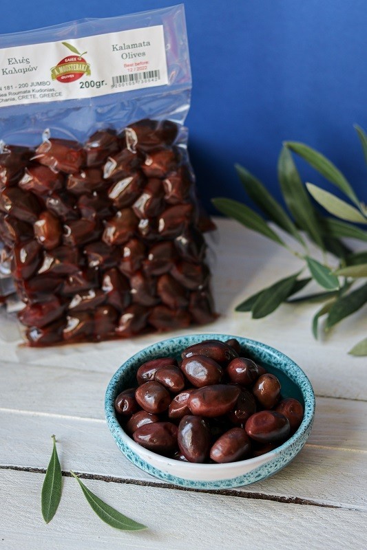 polikala oliwki kalamata w occie z czerwonego winaciemne pakowane próżniowo