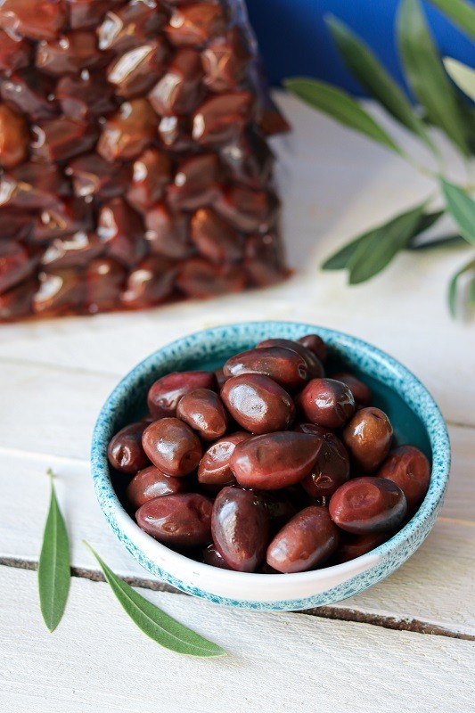 polikala oliwki kalamata w occie z czerwonego winaciemne pakowane próżniowo